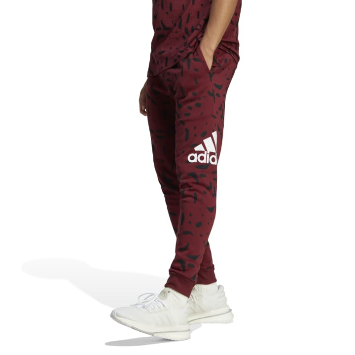 adidas Essentials Tapered Cuff Logo Allover Print Pants